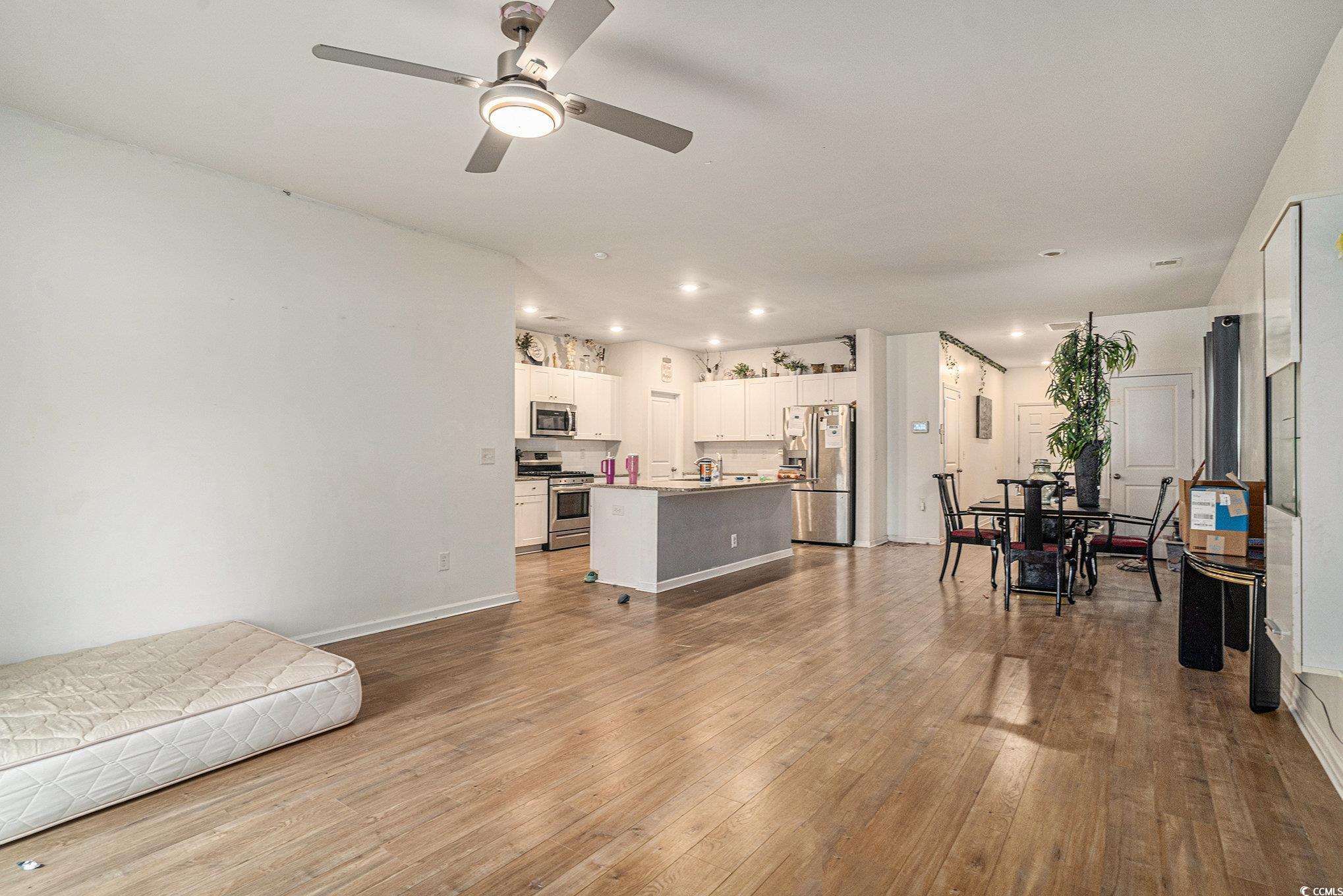 2059 Borgata Loop Longs, SC 29568 - Photo 9 of 34 Living area with hardwood / wood-style floors, cei