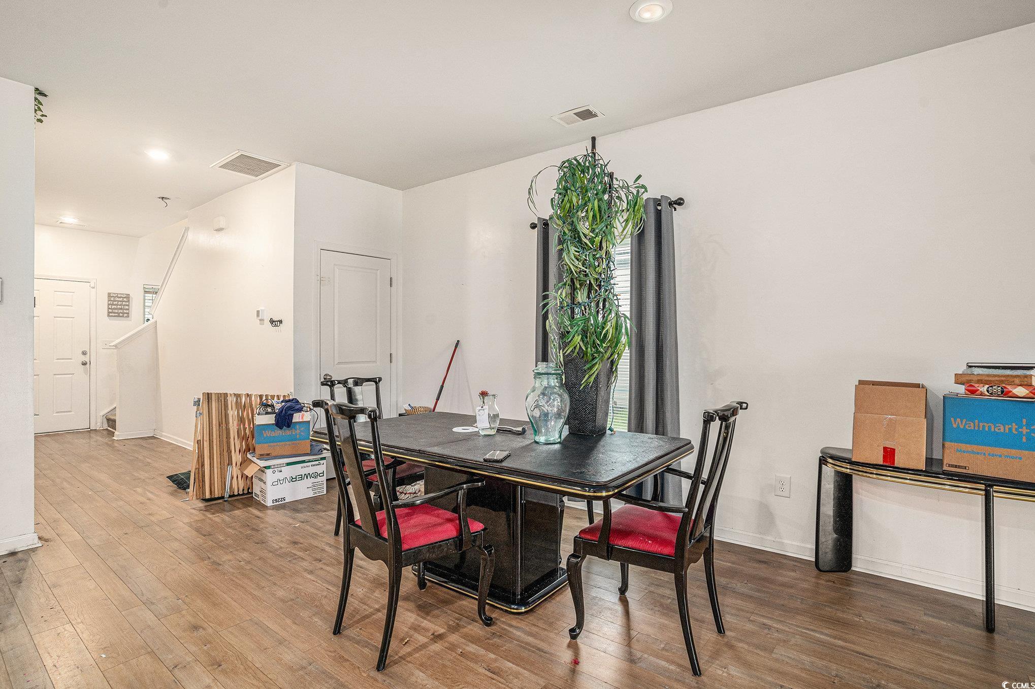 2059 Borgata Loop Longs, SC 29568 - Photo 10 of 34 Dining space featuring wood finished floors, reces