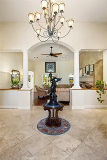 a view of a living room and kitchen