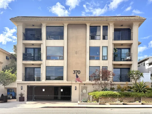a kitchen with refrigerator cabinets and a center island