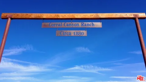 a building with a street sign on it