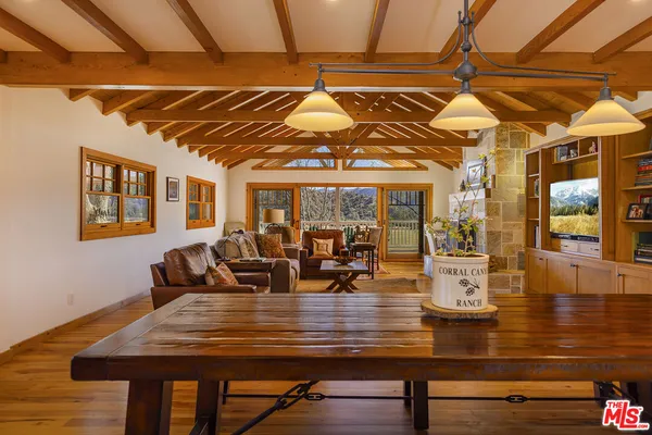 a bathroom with a shower and a sink