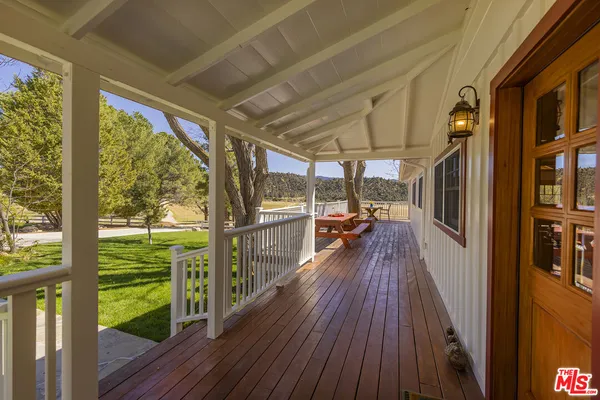 a view of residential houses with outdoor space