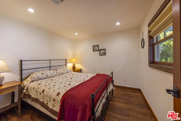a front view of a house with a yard table and chairs