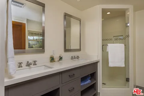 a view of an ocean and a mountain