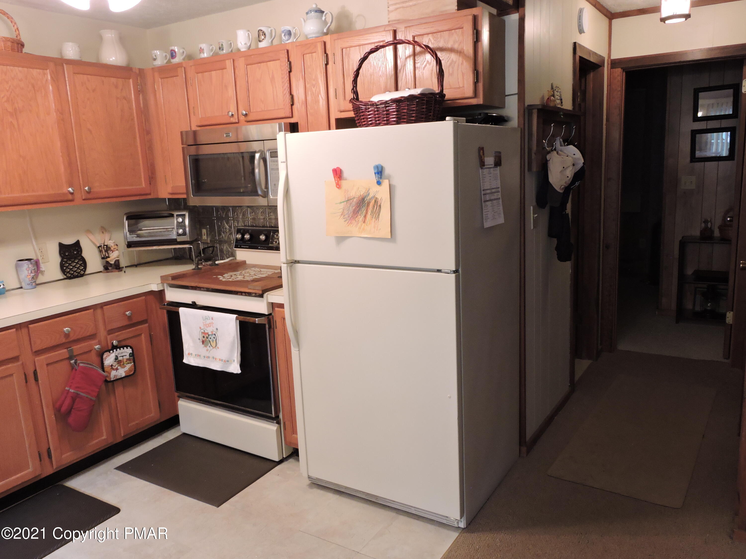 6080 Decker Road Bushkill, PA 18324 - Photo 16 of 48 Alternate Kitchen View & Hallway