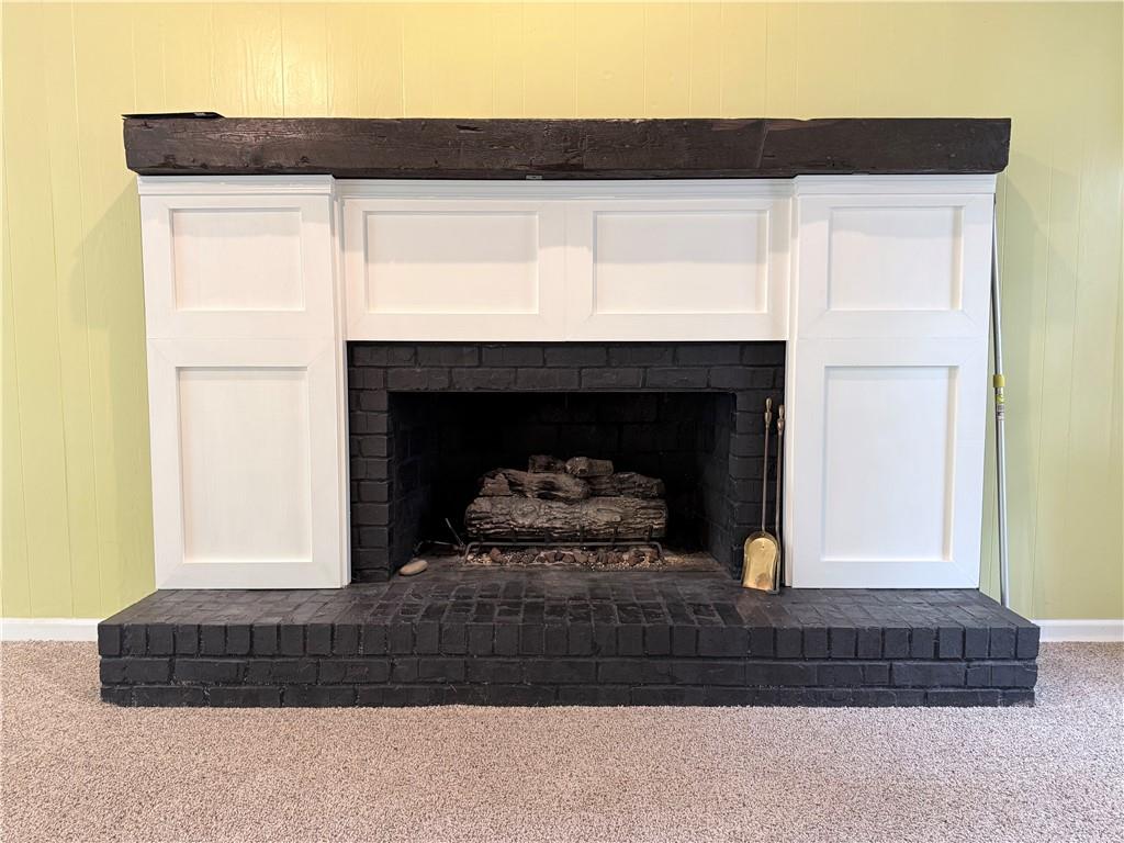 3033 Riviera Drive Conyers, GA 30012 - Photo 9 of 79 a living room with a fireplace