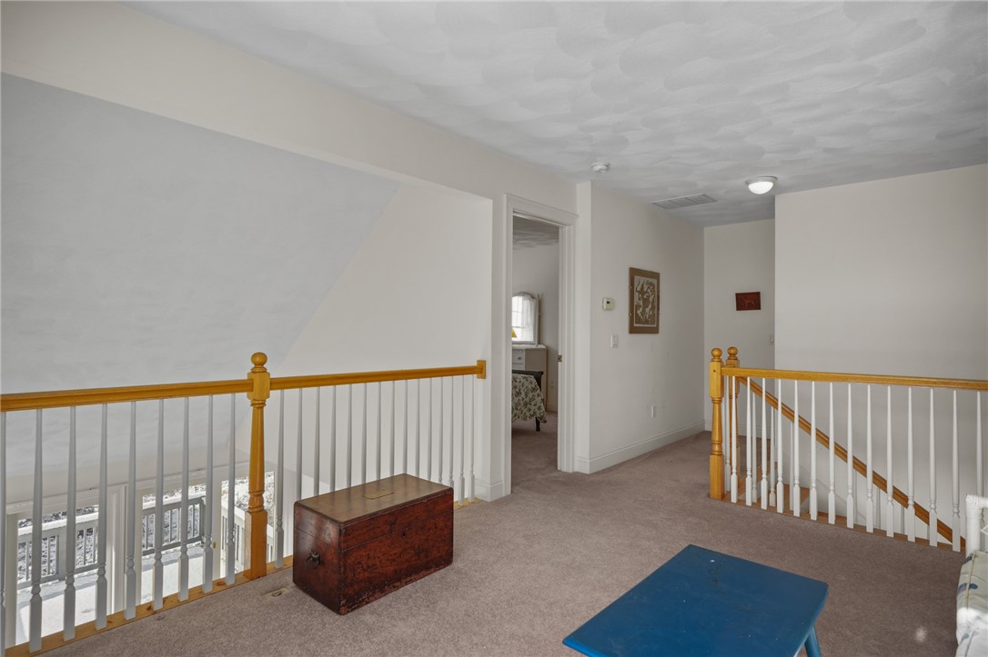 225 Main Channel, Unit 1 Warwick, RI 02889 - Photo 33 of 50 Access to enormous walk in attic storage