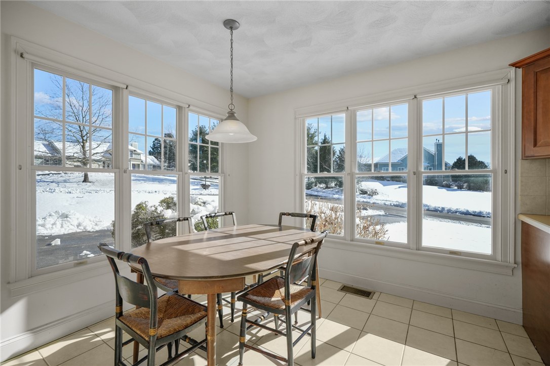 225 Main Channel, Unit 1 Warwick, RI 02889 - Photo 6 of 50 Kitchen eating area loaded with natural light!