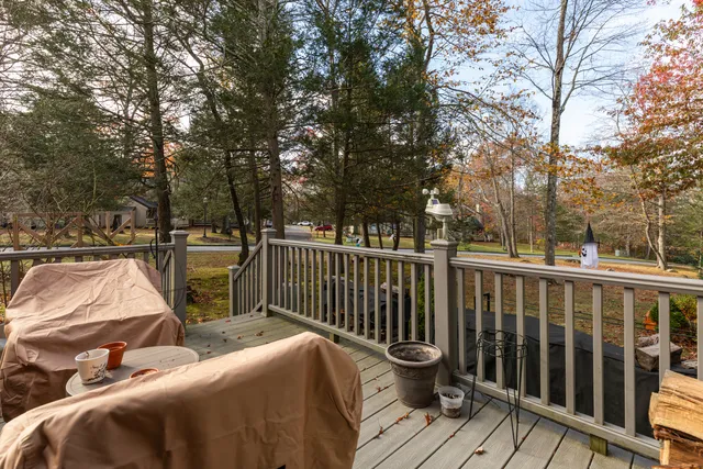 a view of a two chairs next to a yard