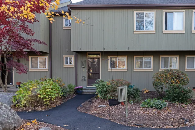 an outdoor sitting area with golf course