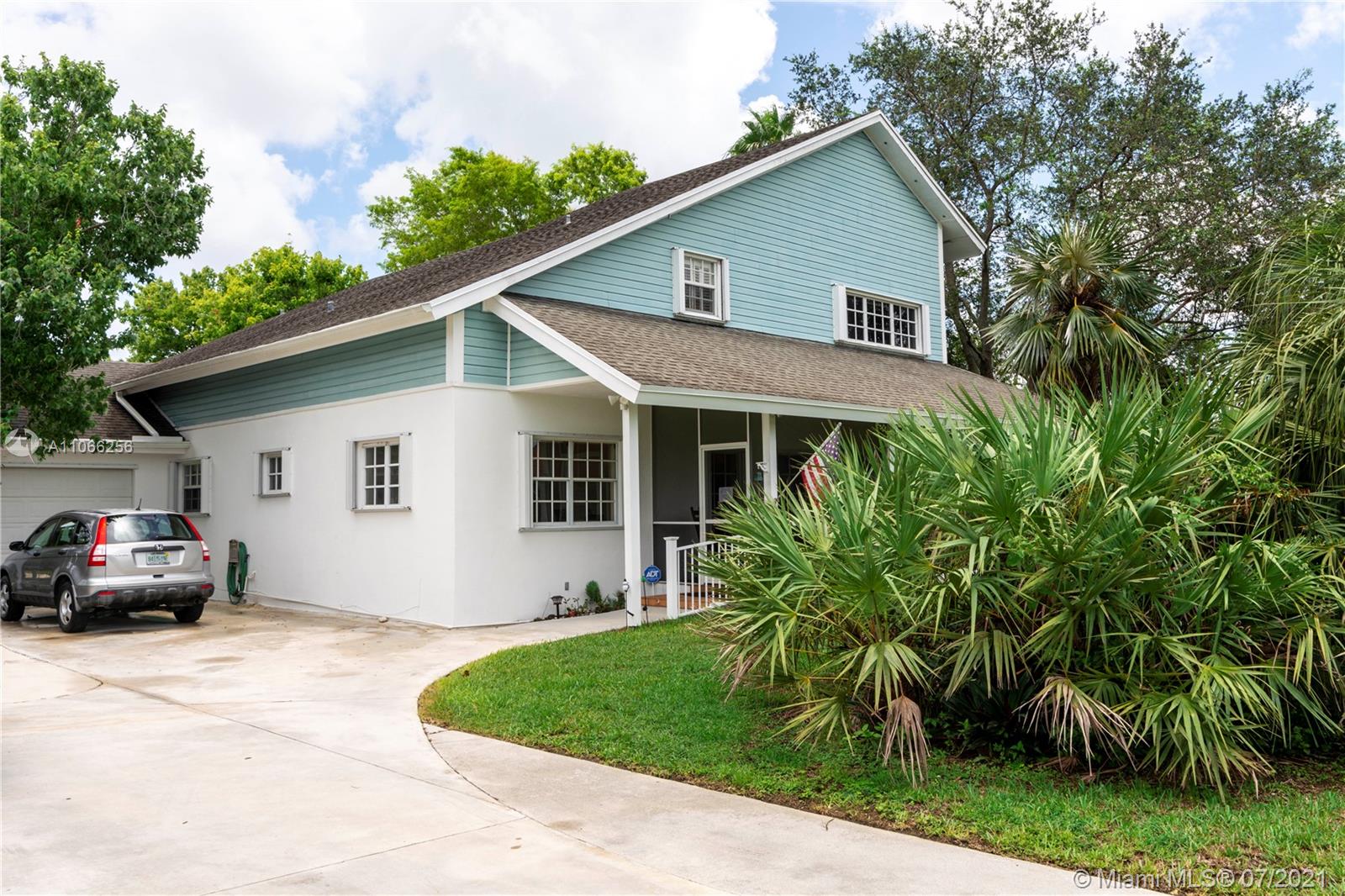 16721 Southwest 278th Street Homestead, FL 33031 - Photo 12 of 20 a house view with a garden space