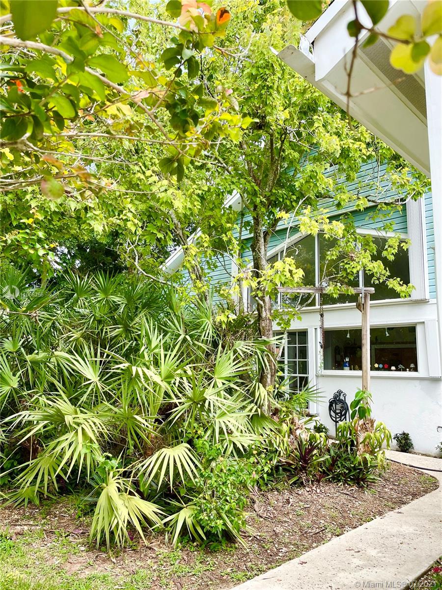16721 Southwest 278th Street Homestead, FL 33031 - Photo 16 of 20 front view of a house with a yard