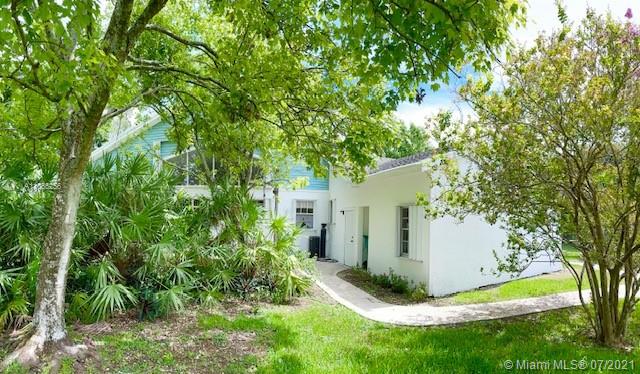 16721 Southwest 278th Street Homestead, FL 33031 - Photo 17 of 20 a view of a house with a tree and yard