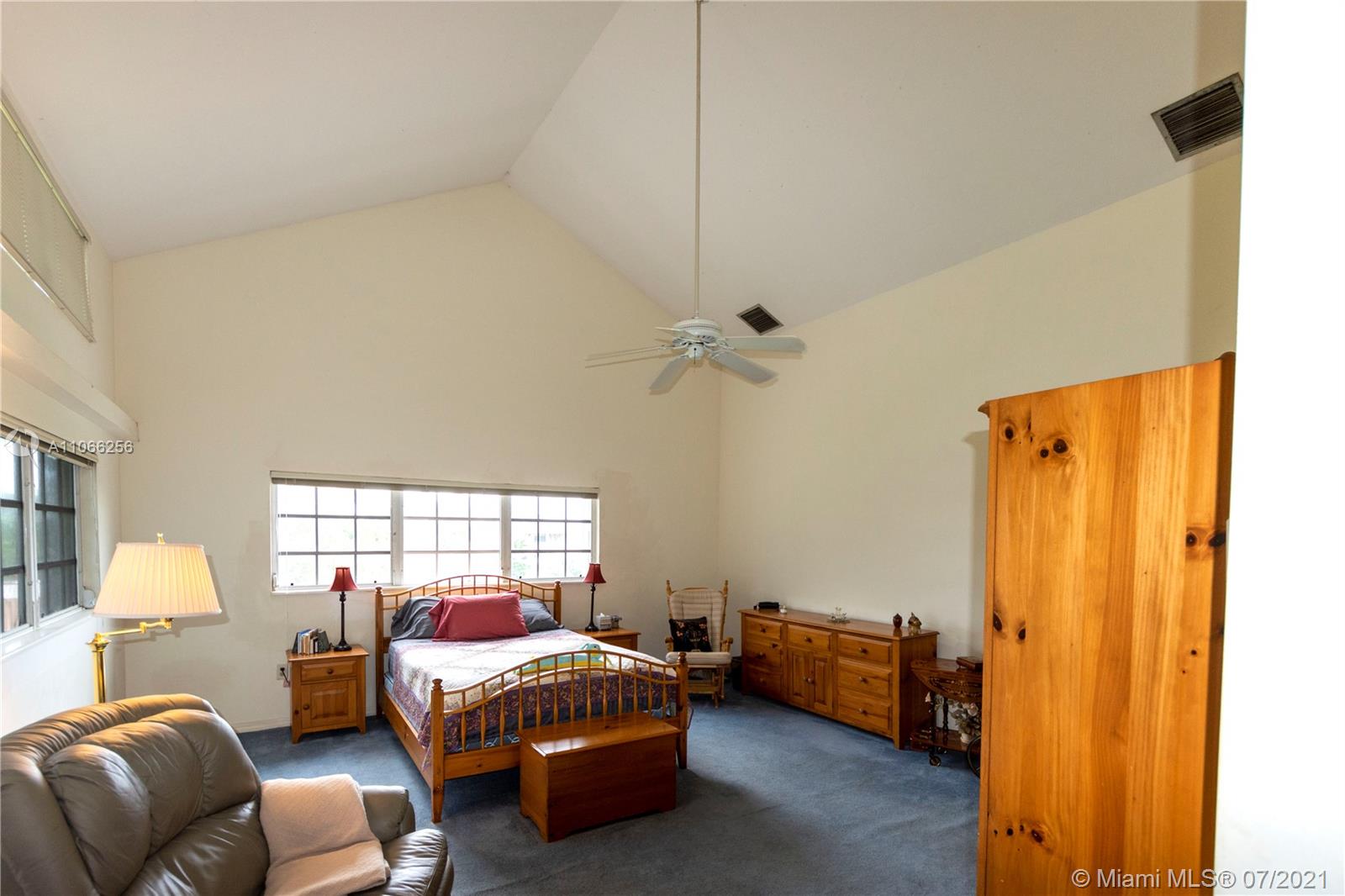 16721 Southwest 278th Street Homestead, FL 33031 - Photo 4 of 20 a bedroom with bed and window