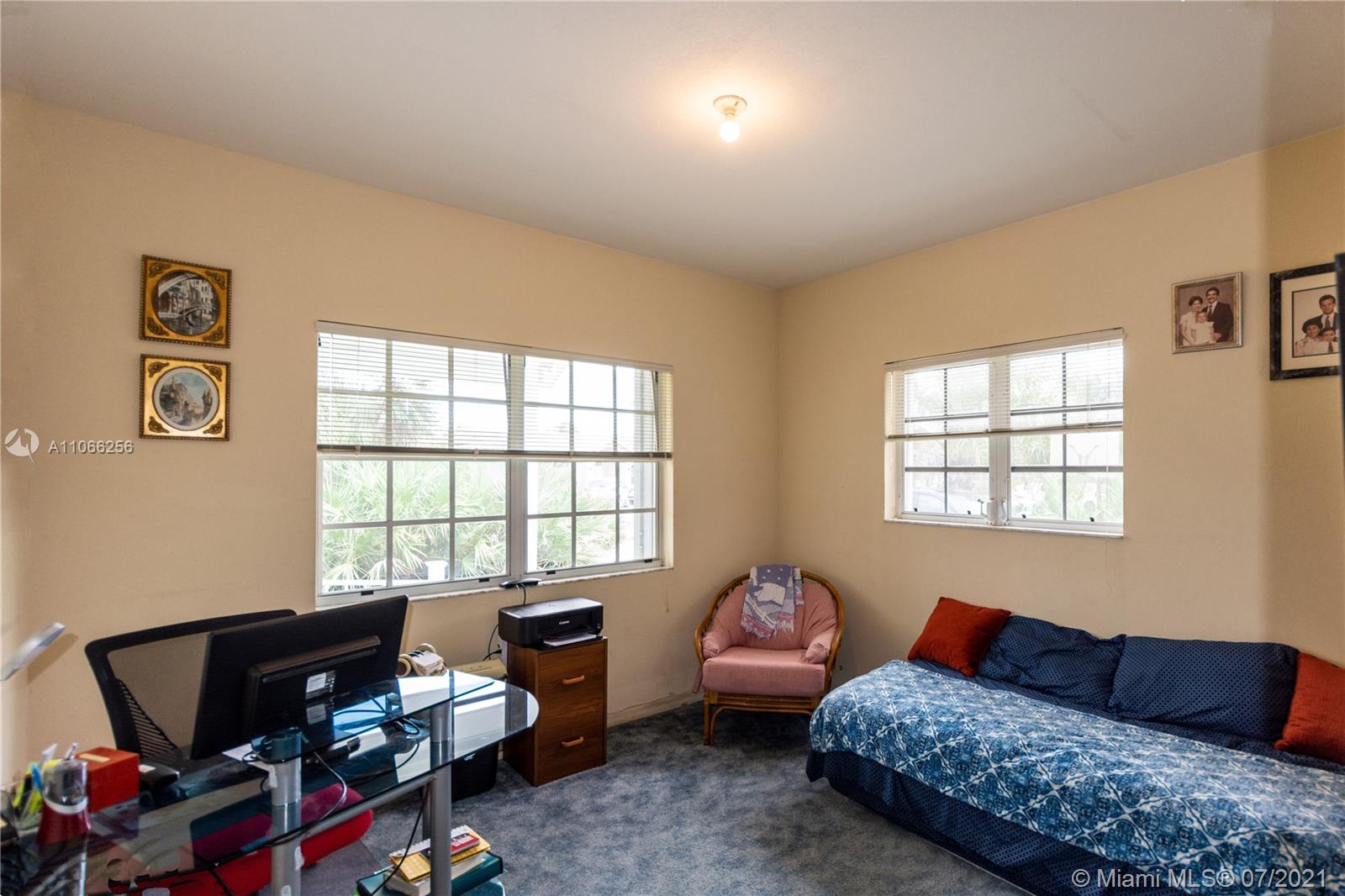 16721 Southwest 278th Street Homestead, FL 33031 - Photo 6 of 20 a living room with furniture and a window