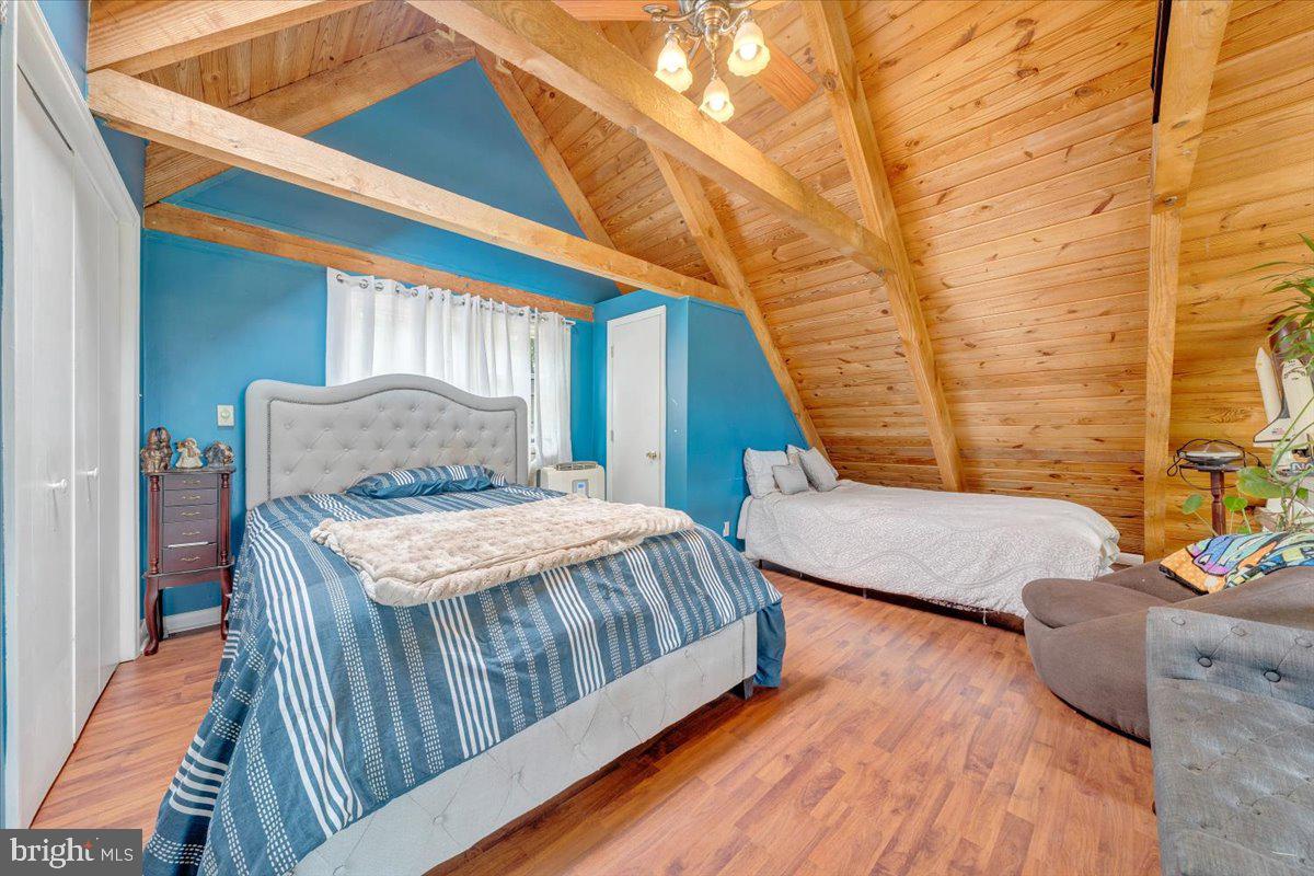 722 Foley Ridge Road Stuart, VA 24171 - Photo 37 of 67 Cozy attic retreat with wooden beams.