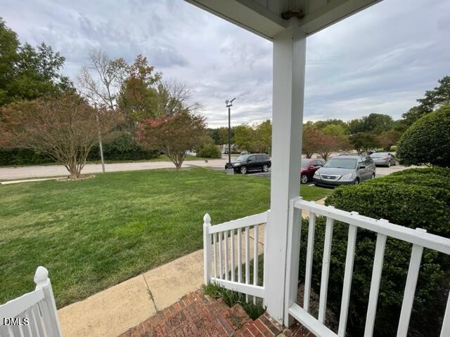 4804 Hoyle Drive, Unit A Raleigh, NC 27604 - Photo 2 of 19 a view of a porch with a yard
