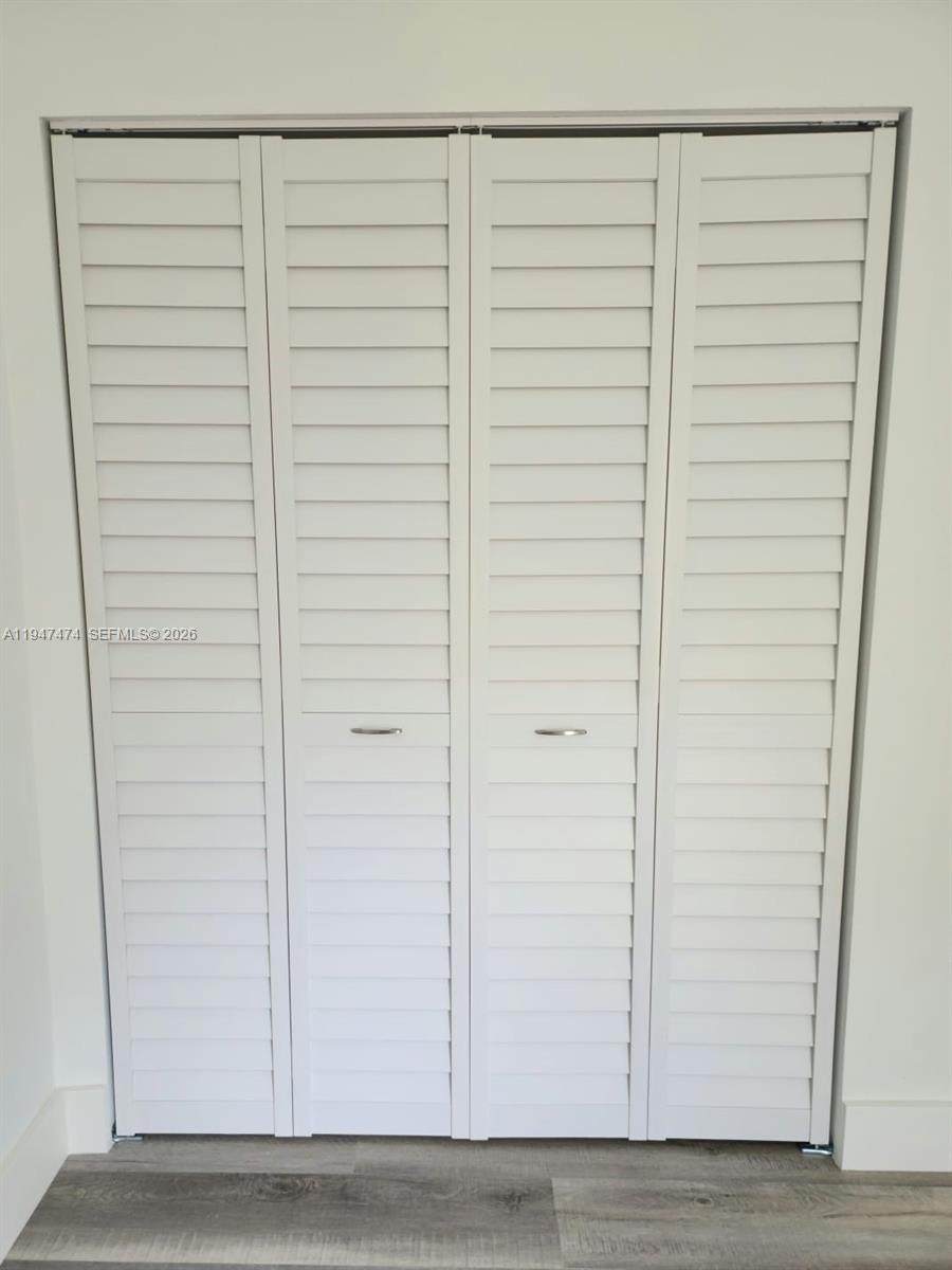 4545 Treehouse Lane, Unit H Tamarac, FL 33319 - Photo 20 of 24 a view of closet area