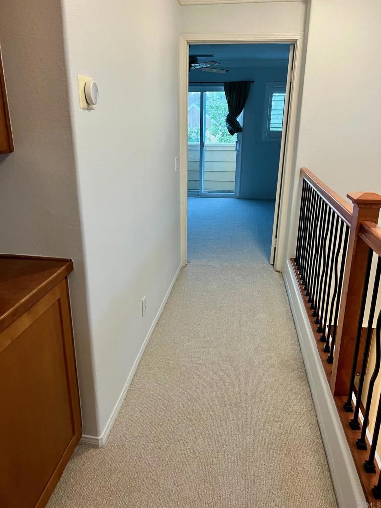 51 Palladium Lane Ladera Ranch, CA 92694 - Photo 15 of 24 a view of a hallway view with wooden floor and staircase