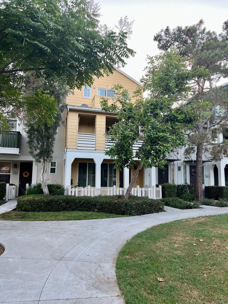 51 Palladium Lane Ladera Ranch, CA 92694 - Photo 2 of 24 a front view of a house with a yard and garage