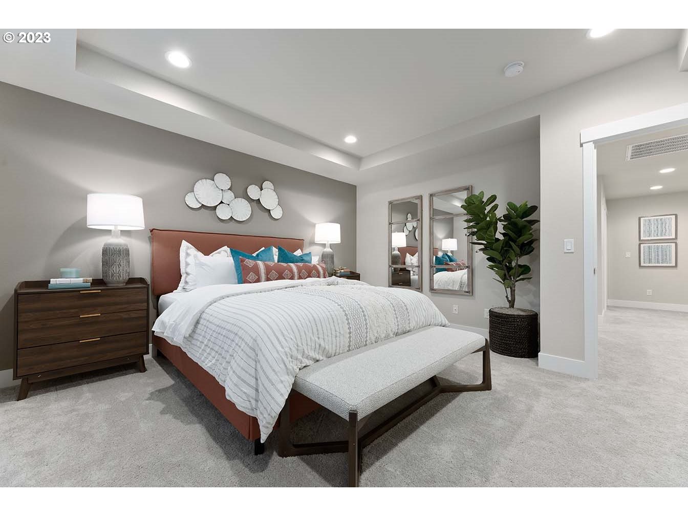 302 North 89th Loop Ridgefield, WA 98642 - Photo 12 of 29 a bedroom with a bed and a large mirror