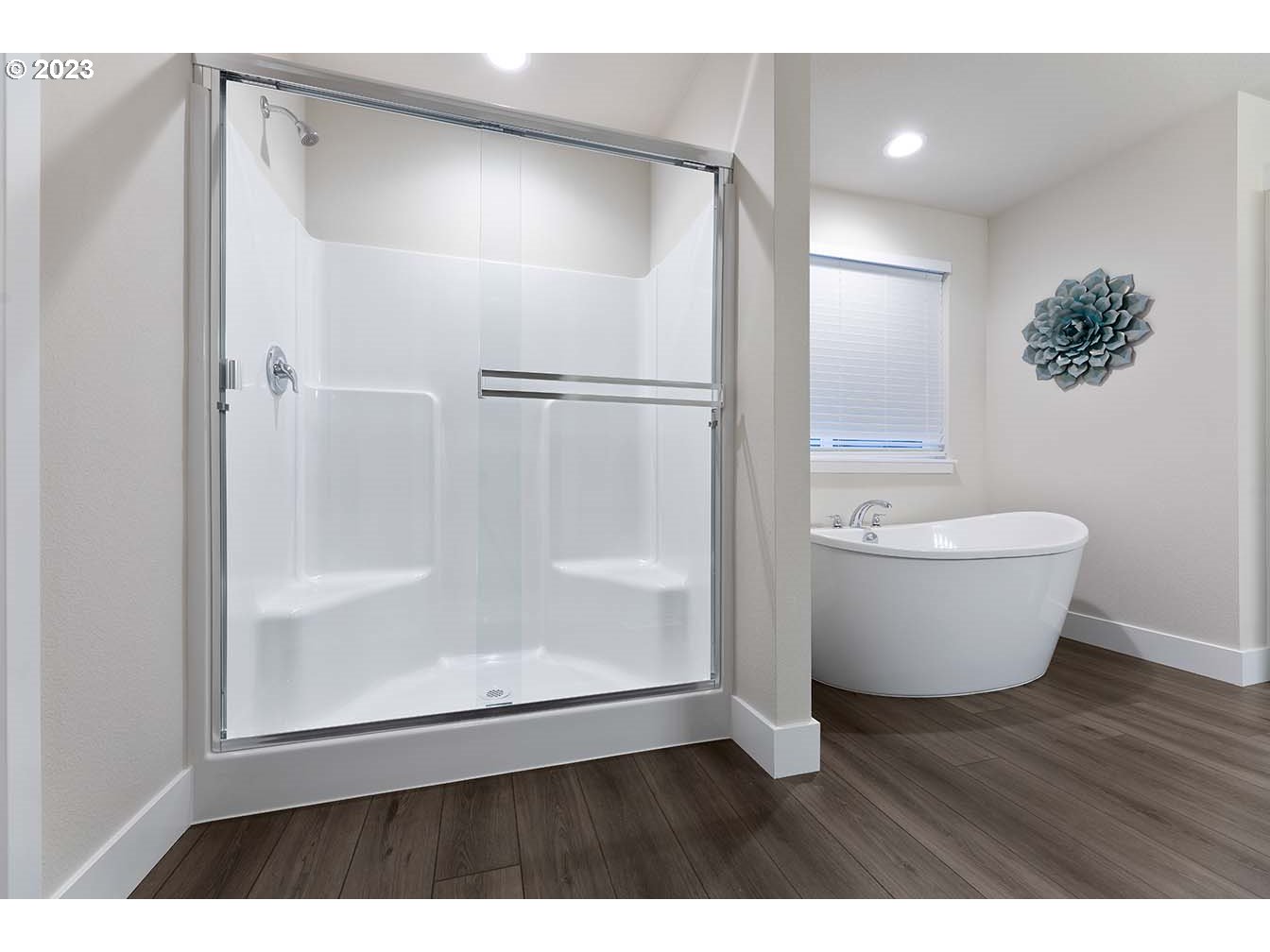 302 North 89th Loop Ridgefield, WA 98642 - Photo 15 of 29 a bathroom with a bathtub and shower