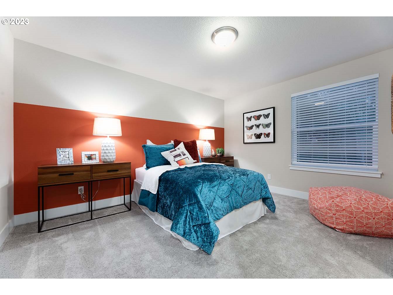 302 North 89th Loop Ridgefield, WA 98642 - Photo 19 of 29 a bedroom with a bed and window