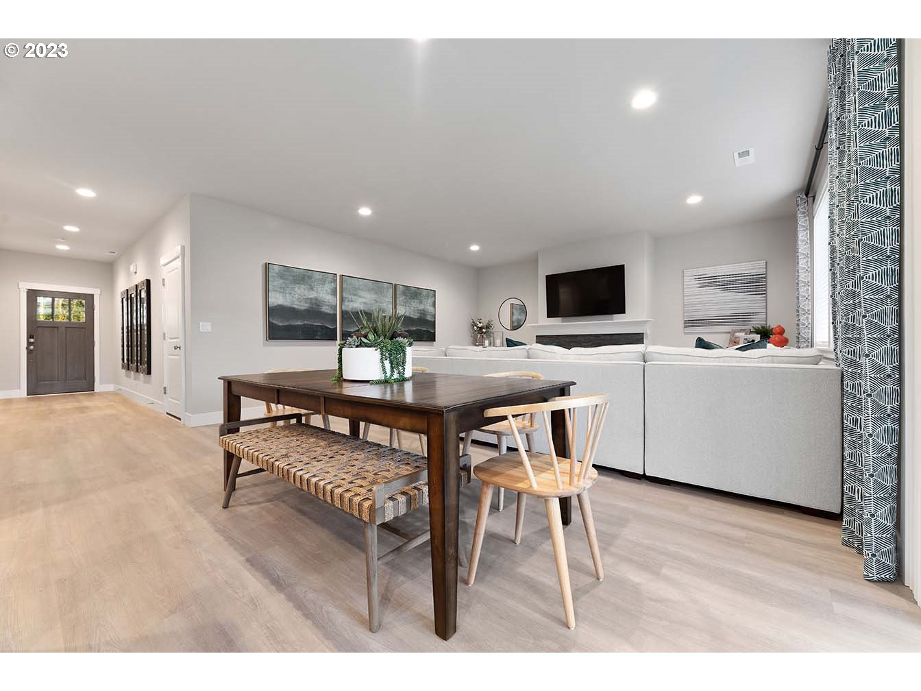 302 North 89th Loop Ridgefield, WA 98642 - Photo 3 of 29 a open kitchen with stainless steel appliances kitchen island granite countertop a sink and cabinets