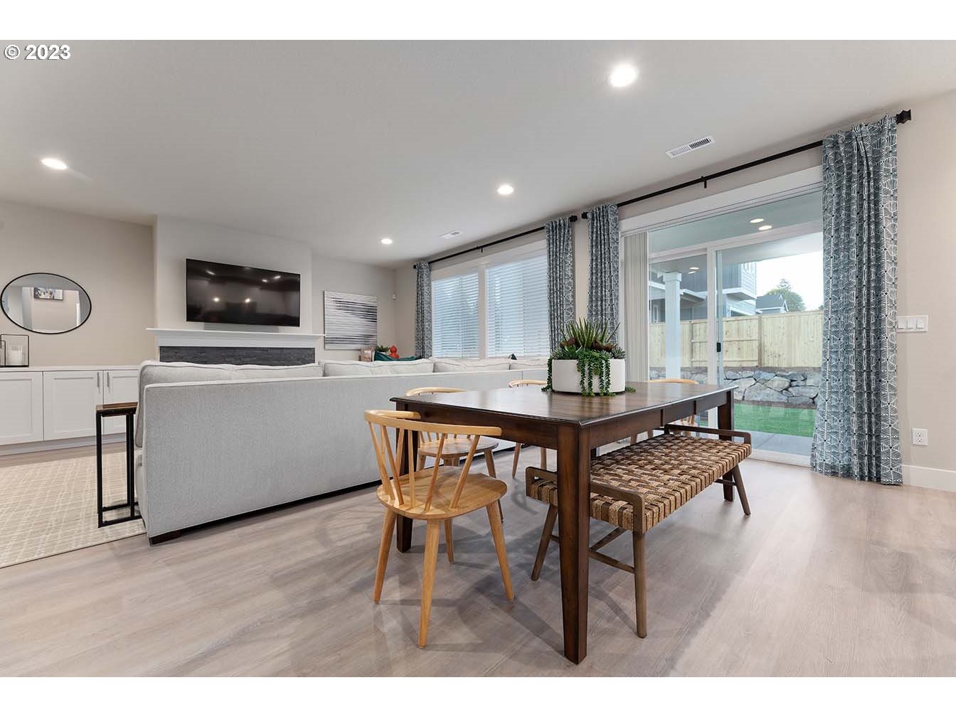 302 North 89th Loop Ridgefield, WA 98642 - Photo 4 of 29 a living room with furniture and a flat screen tv