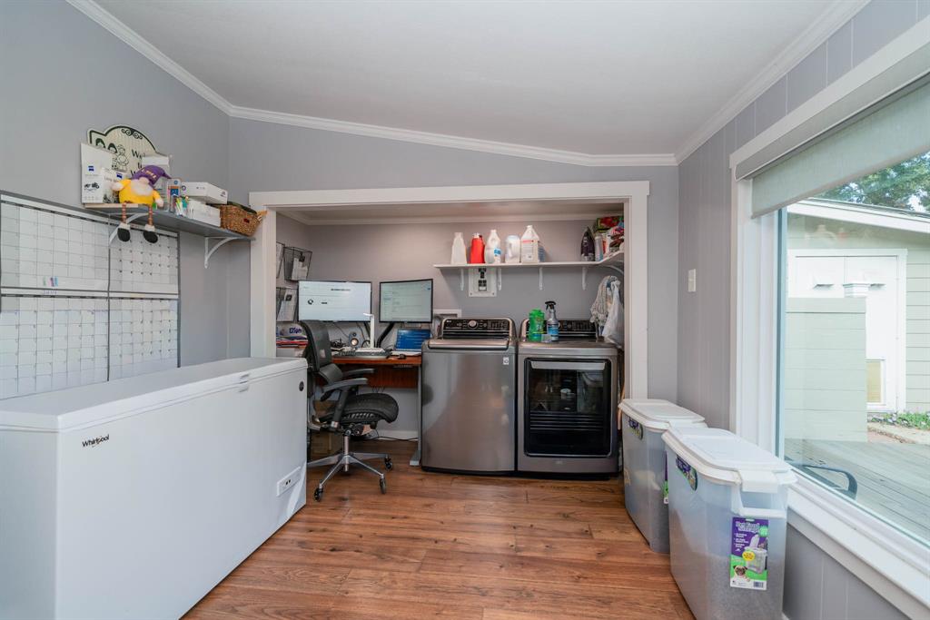 1901 Byrd Road Jacksonville, TX 75766 - Photo 14 of 40 a kitchen with a refrigerator a stove top oven a sink and dishwasher