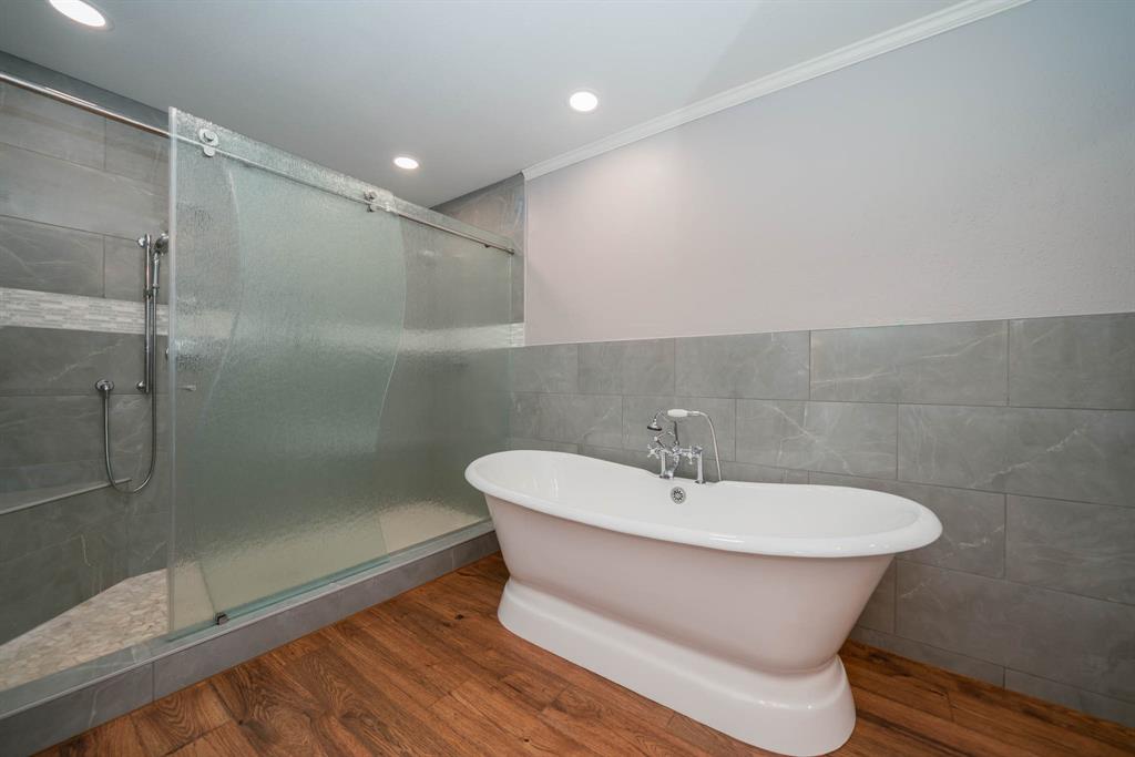 1901 Byrd Road Jacksonville, TX 75766 - Photo 20 of 40 a bathroom with a sink and a mirror