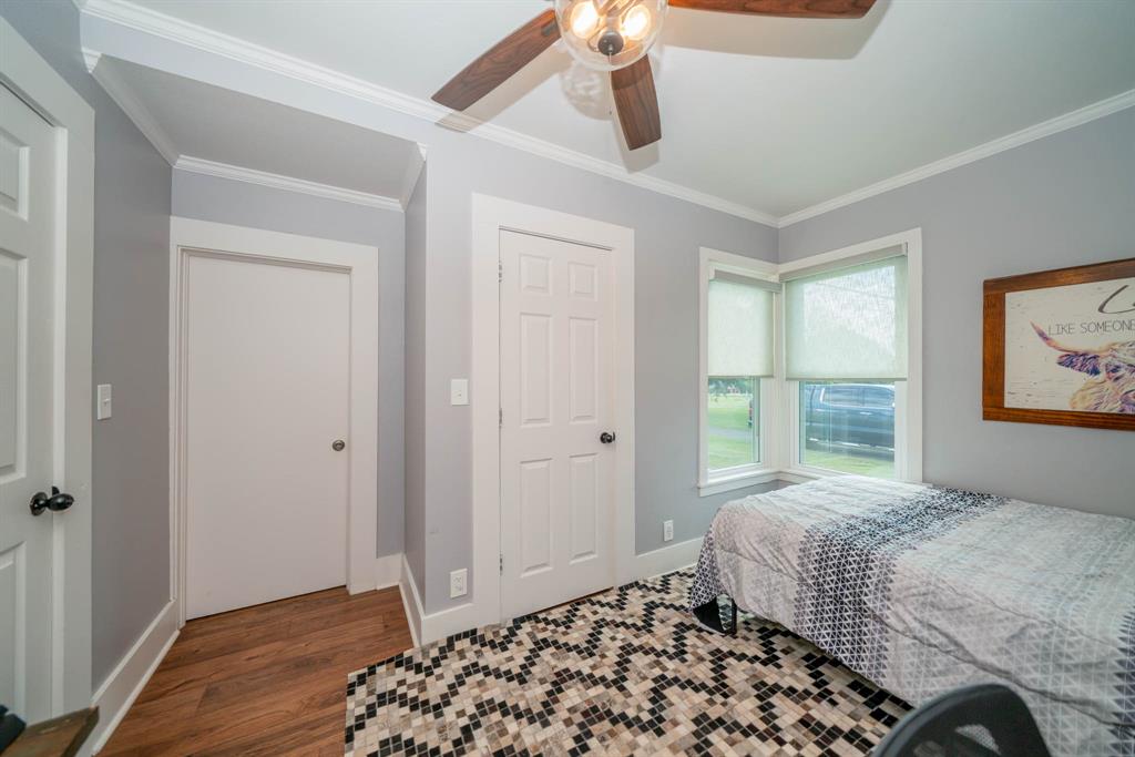 1901 Byrd Road Jacksonville, TX 75766 - Photo 24 of 40 a bedroom with a bed and a window