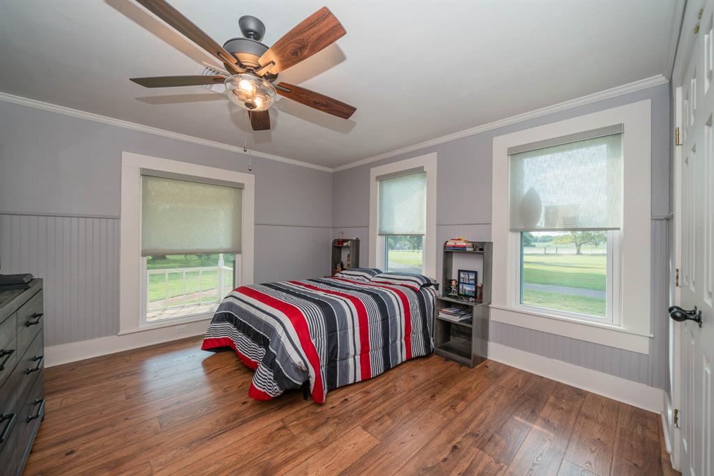1901 Byrd Road Jacksonville, TX 75766 - Photo 29 of 40 a bedroom with a bed and a window