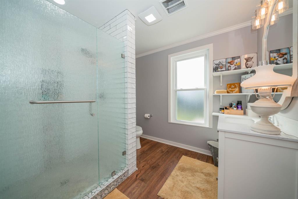 1901 Byrd Road Jacksonville, TX 75766 - Photo 30 of 40 a bathroom with a sink and a shower