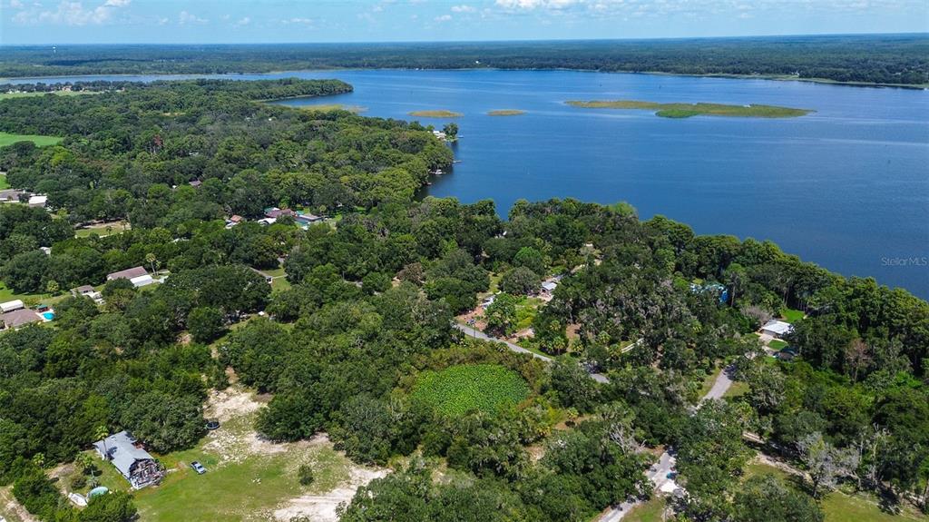 8601 West Bass Lake Road, Unit 12 Crystal River, FL 34428 - Photo 5 of 22 an aerial view of a houses with ocean view