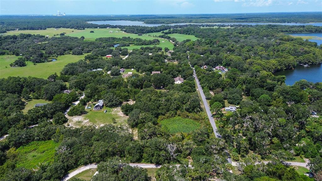 8601 West Bass Lake Road, Unit 12 Crystal River, FL 34428 - Photo 6 of 22 an aerial view of a forest with houses