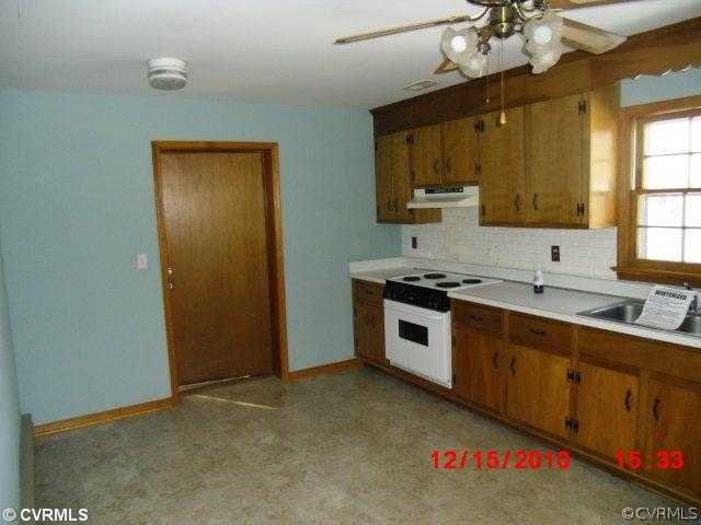 10620 Trents Bridge Road Chesterfield, VA 23838 - Photo 3 of 6 a kitchen with stainless steel appliances a sink stove and cabinets