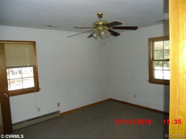 10620 Trents Bridge Road Chesterfield, VA 23838 - Photo 4 of 6 an empty room with a window