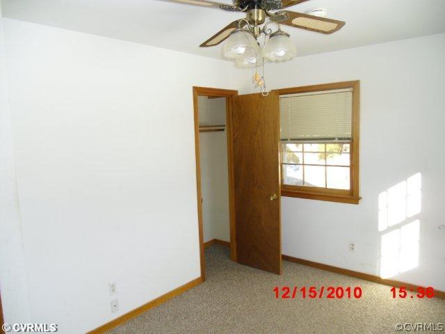 10620 Trents Bridge Road Chesterfield, VA 23838 - Photo 5 of 6 an empty room with a window