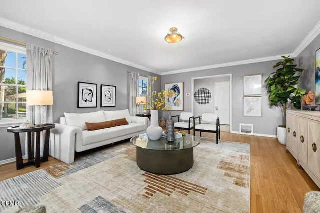 a living room with furniture and a couch