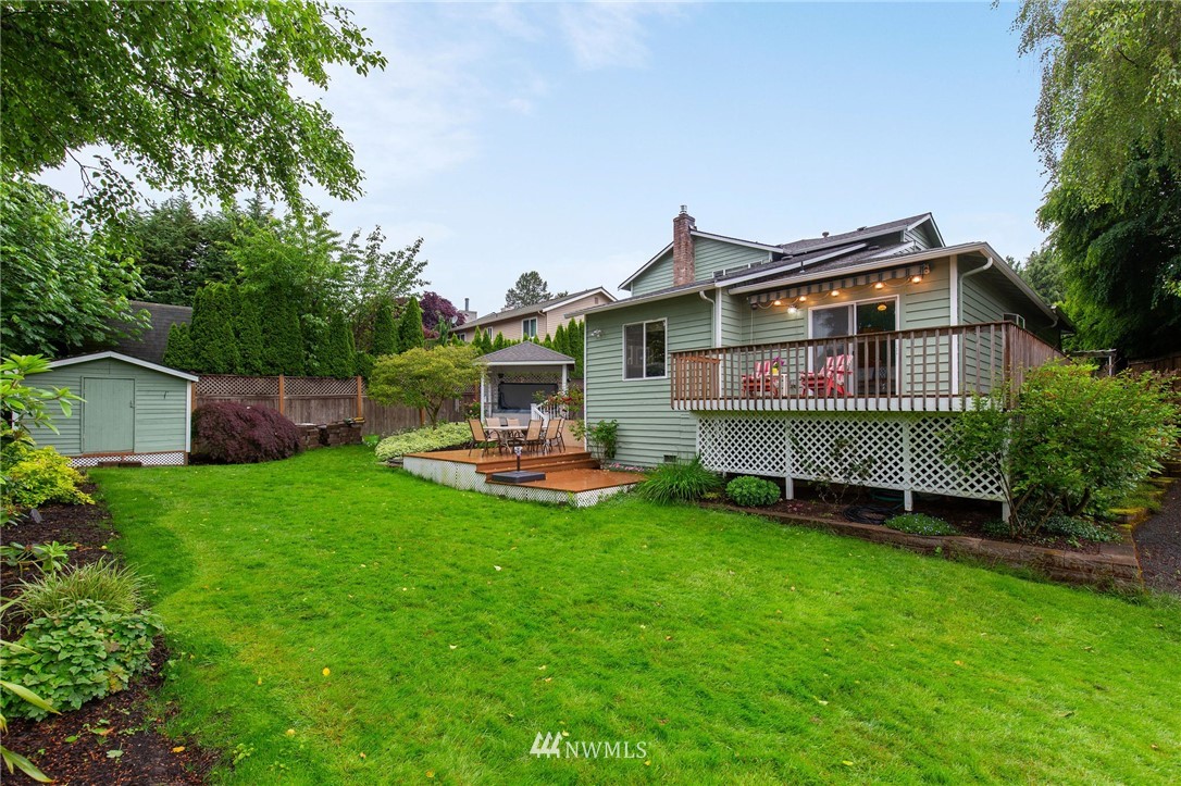 102 237th Place Southwest Bothell, WA 98021 - Photo 33 of 34 a front view of a house with patio and garden