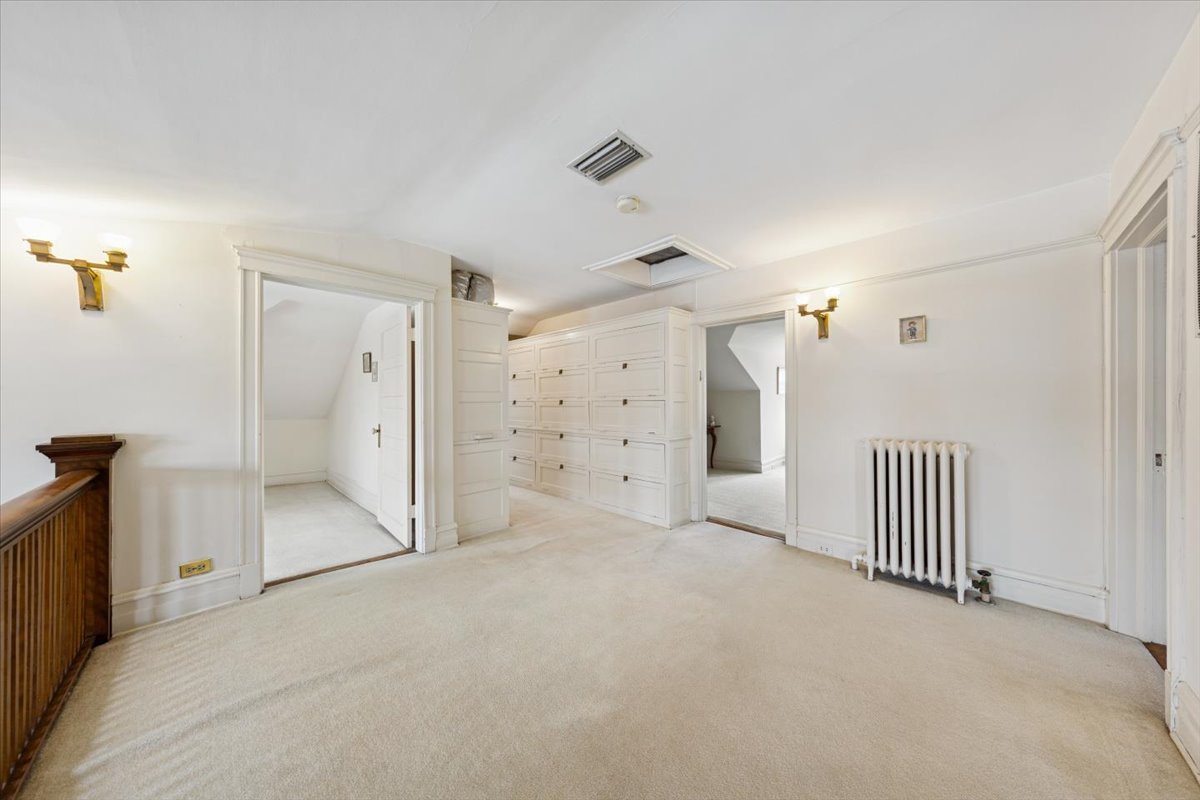1235 Ridge Avenue Evanston, IL 60202 - Photo 24 of 36 a view of a livingroom with a staircase