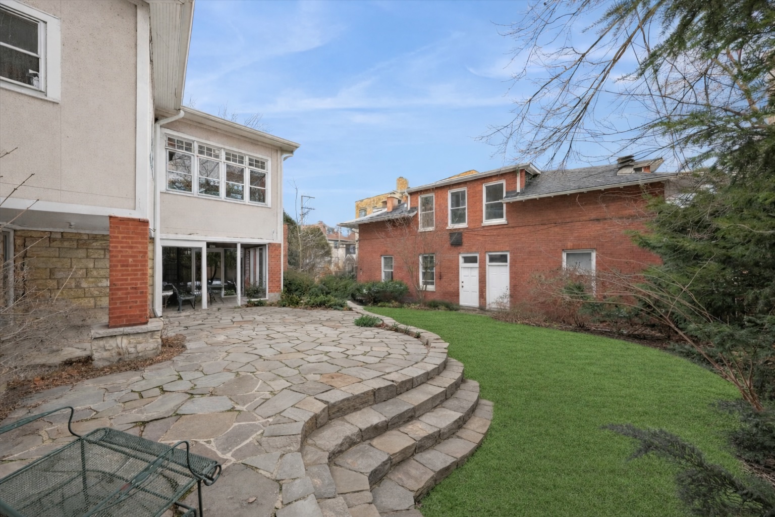 1235 Ridge Avenue Evanston, IL 60202 - Photo 29 of 36 a front view of a house with garden