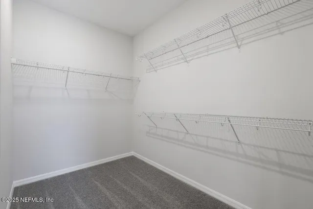 a view of a room with racks on the wall