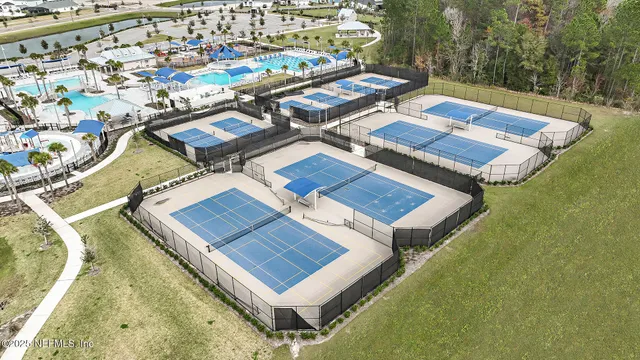 a view of a swimming pool with a backyard