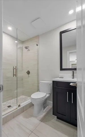 a view of a garden with palm trees