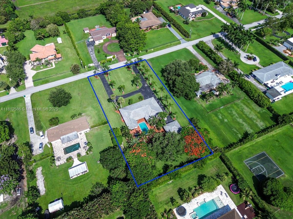 3030 Southwest 117th Avenue Davie, FL 33330 - Photo 44 of 47 an aerial view of a residential houses with outdoor space