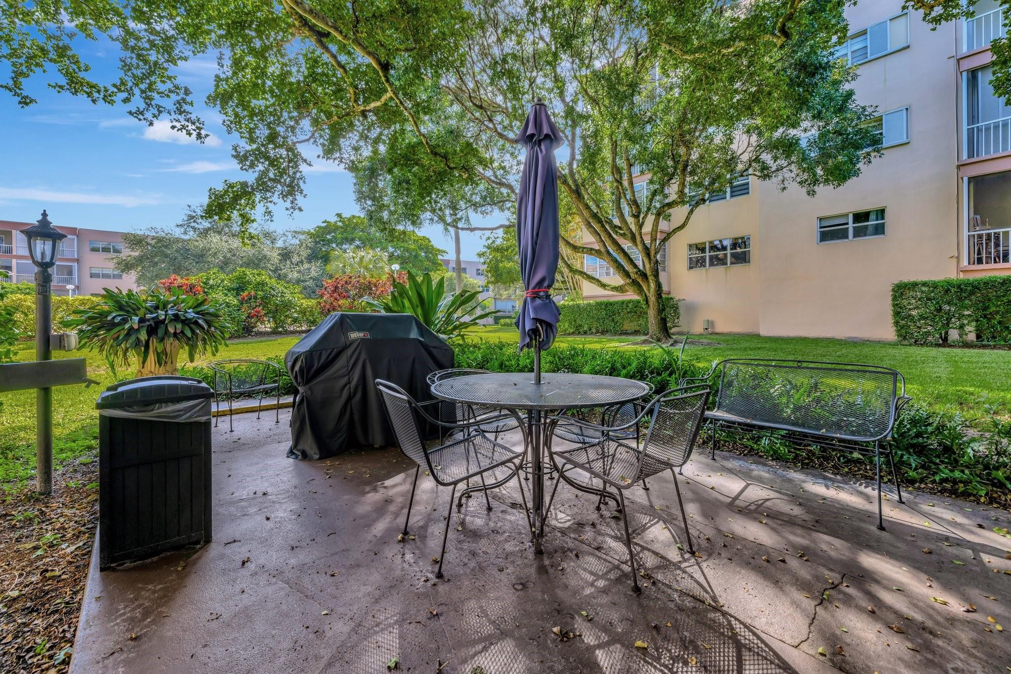 6731 Cypress Road, Unit 111 Plantation, FL 33317 - Photo 20 of 37 Community Grill/Patio Area
