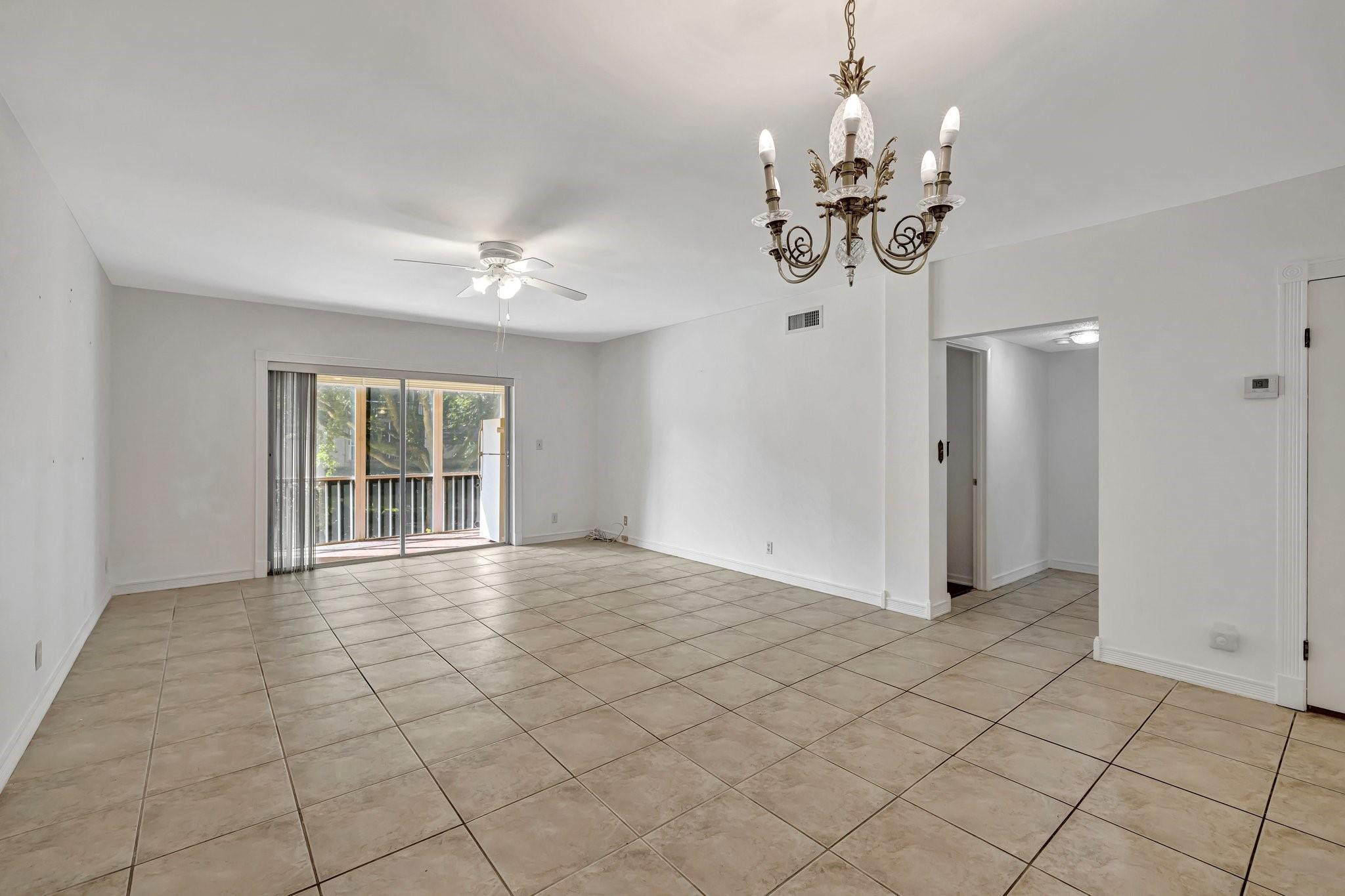 6731 Cypress Road, Unit 111 Plantation, FL 33317 - Photo 8 of 37 Living Area with Balcony
